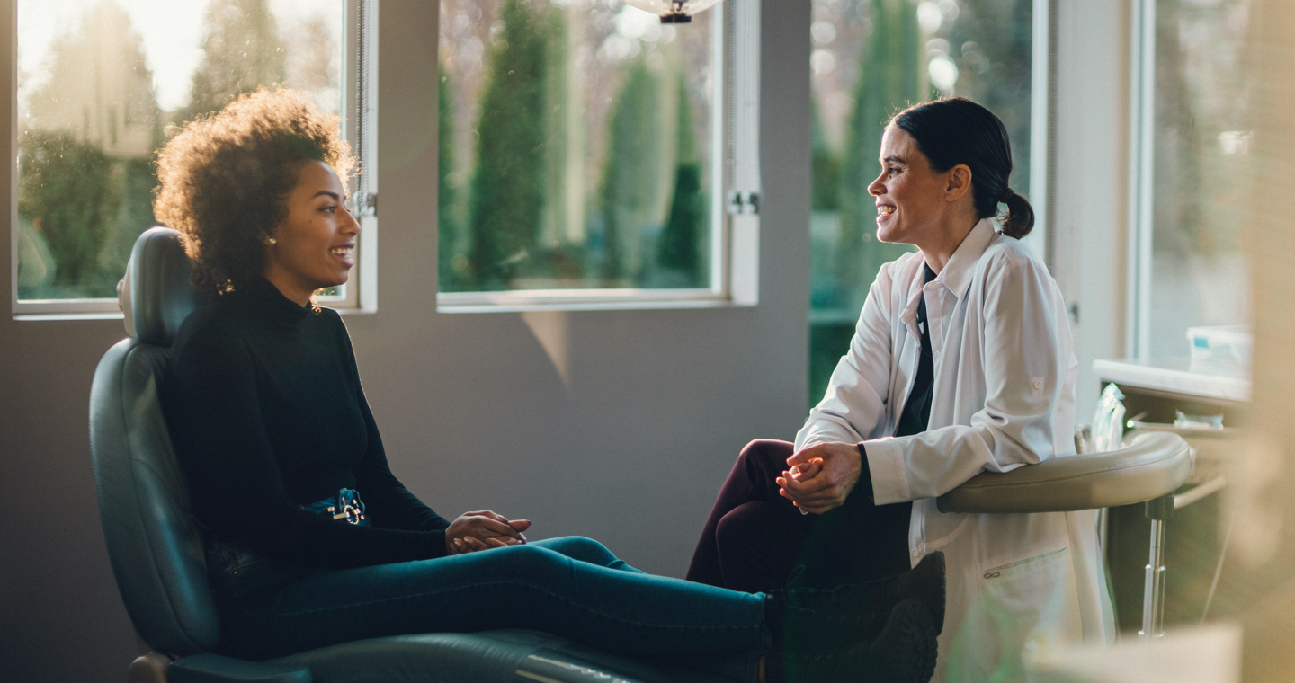 Dentist and patient in office