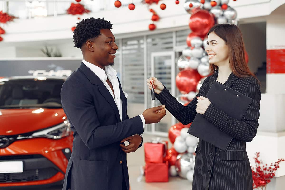 auto dealer working with customer