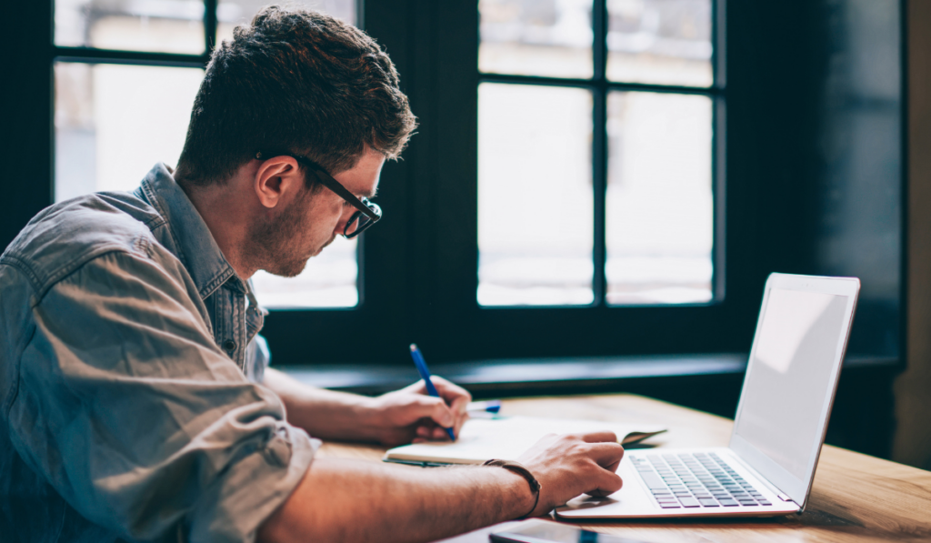 man working on a business plan